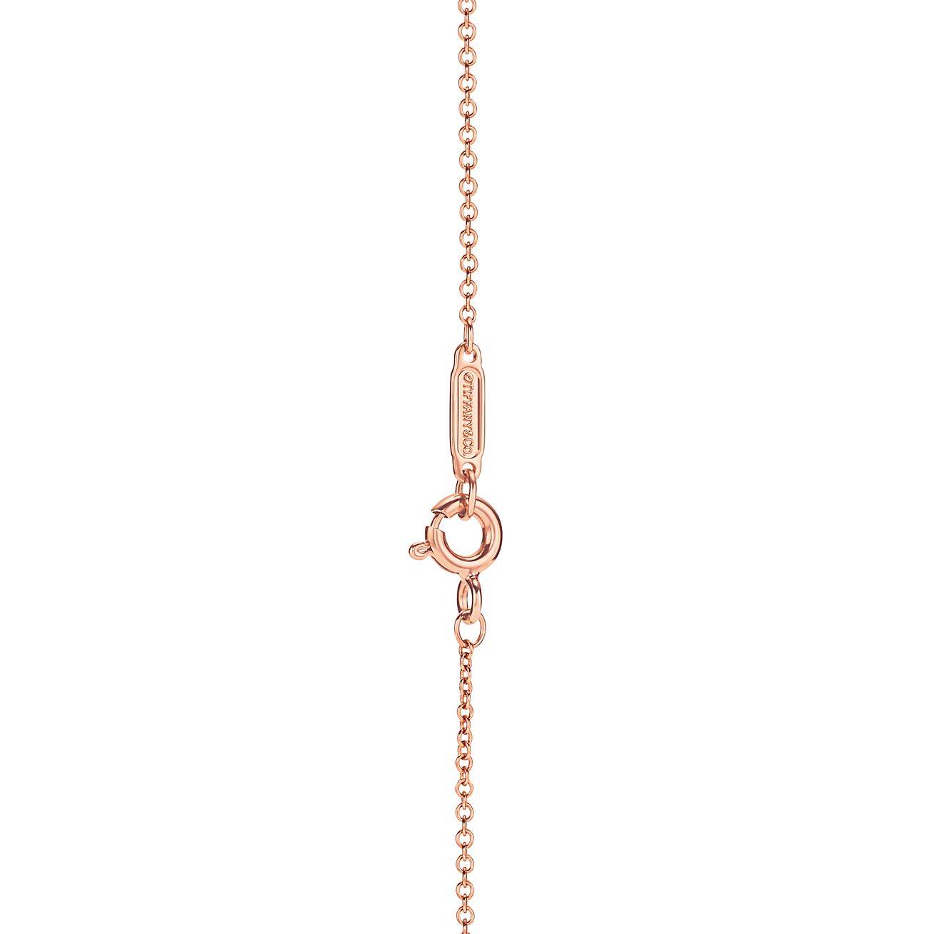 Tiffany T Diamond Pendant in 18k Rose Gold with a Baguette Diamond