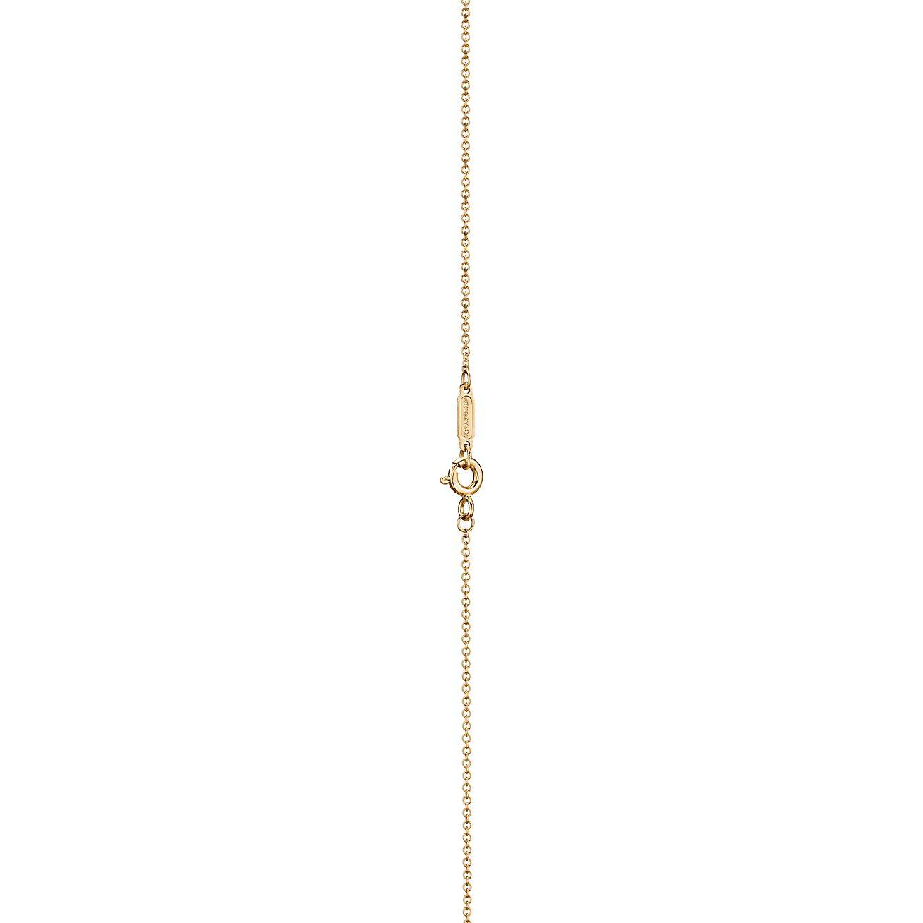 TIFFANY T SMILE PENDANT IN YELLOW GOLD WITH DIAMONDS, SMALL