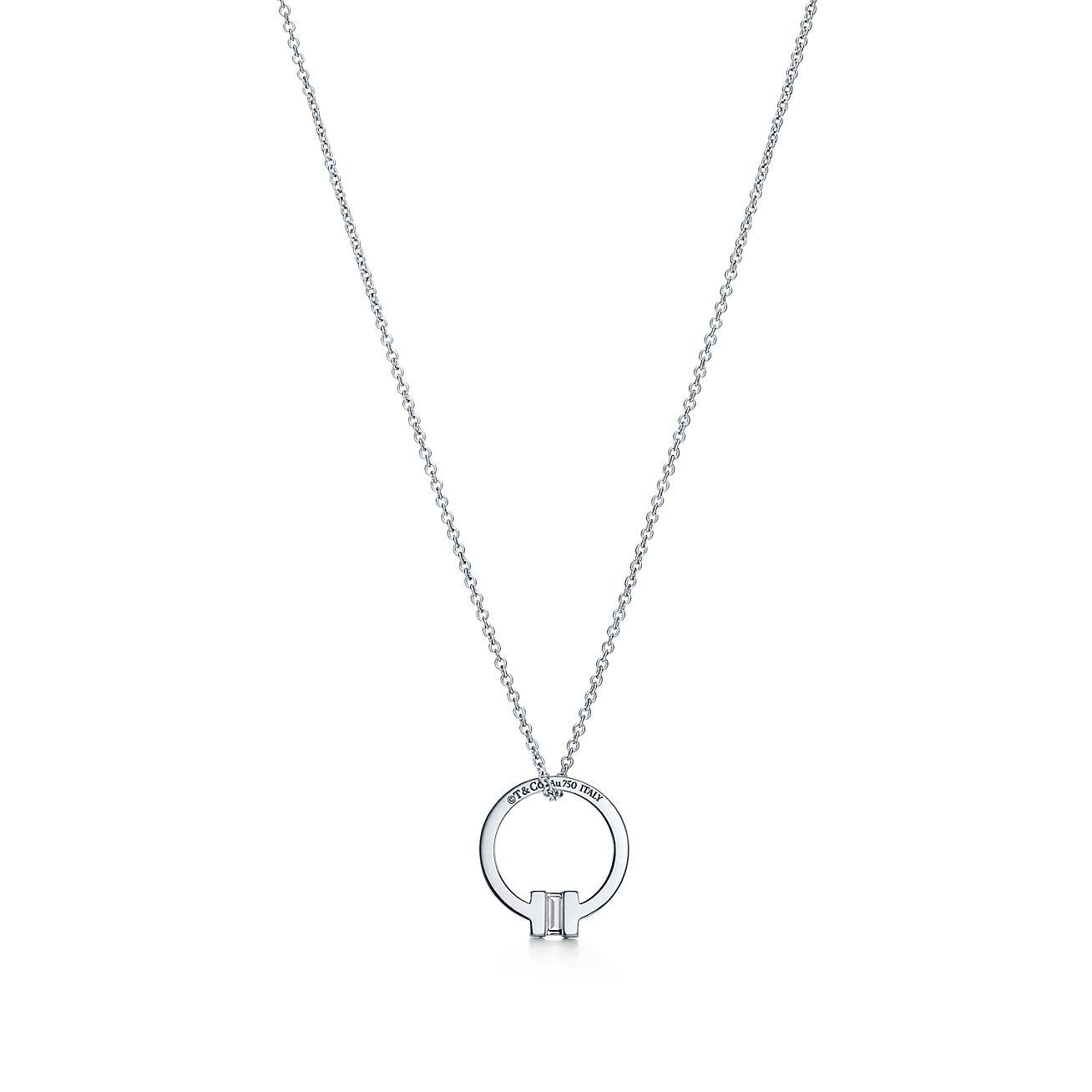 TIFFANY T PENDANT IN 18K WHITE GOLD WITH A BAGUETTE DIAMOND